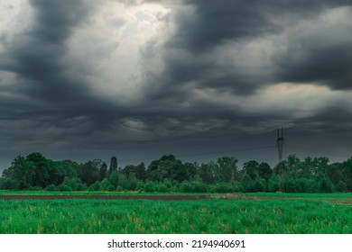 Black, heavy, undulating storm clouds. They are awe-inspiring, foreshadowing the arrival of sudden rains and life-threatening winds. - Shutterstock ID 2194940691