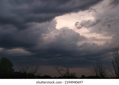 Black, heavy, undulating storm clouds. They are awe-inspiring, foreshadowing the arrival of sudden rains and life-threatening winds. - Shutterstock ID 2194940697