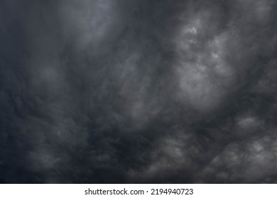 Black, heavy, undulating storm clouds. They are awe-inspiring, foreshadowing the arrival of sudden rains and life-threatening winds. - Shutterstock ID 2194940723