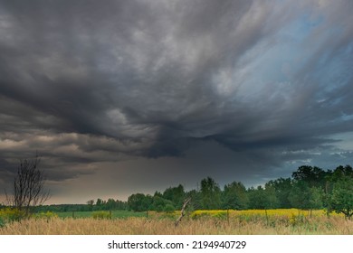 Black, heavy, undulating storm clouds. They are awe-inspiring, foreshadowing the arrival of sudden rains and life-threatening winds. - Shutterstock ID 2194940729
