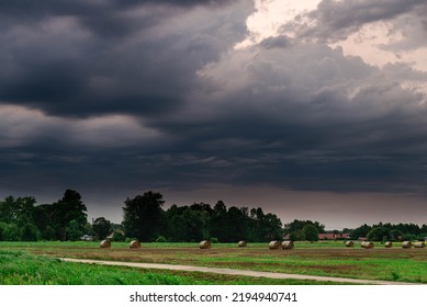 Black, heavy, undulating storm clouds. They are awe-inspiring, foreshadowing the arrival of sudden rains and life-threatening winds. - Shutterstock ID 2194940741