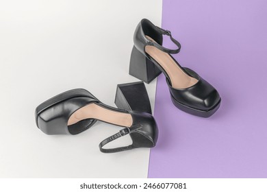 Black High-Heel Shoes on Split White and Purple Background - Fashion, Footwear, Stylish Design - Powered by Shutterstock