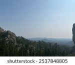 The Black Hills Mountains in South Dakota offer a mix of rugged peaks, lush forests, and rich history. This enchanting landscape is home to diverse wildlife and iconic landmarks like Mount Rushmore.