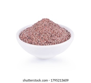 Black Himalayan Salt (Namakh shell salt) or black salt of South Asia In a separate white cup on a white background