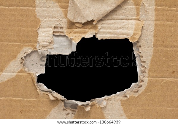black hole in a cardboard\
background