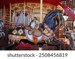 Black Horse Object Of The Funfair Retro Carousel. Beautiful Colorful Street Festival. 