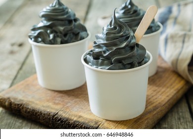 Black Ice Cream In White Cups