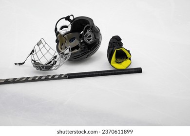 black Ice hockey helmet with mask protection face on ice field - Powered by Shutterstock