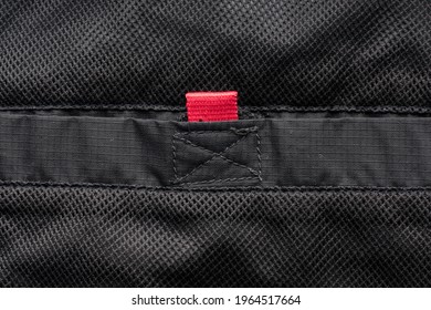 Black inside pocket with red Velcro, full frame