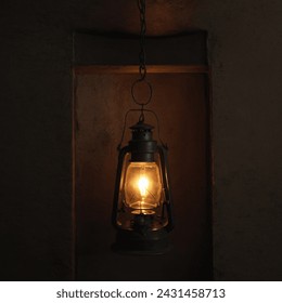 black kerosene lamp, Lantern Glass oil lamp, vintage object concept, with dark or nighttime background - Powered by Shutterstock