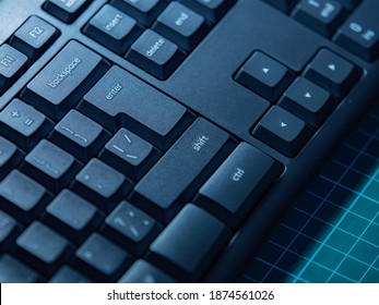 Black keyboard close-up. Control keys on the keyboard. Backspace, enter,shift, delete, and insert keys. Computer peripherals. Working on a personal computer.