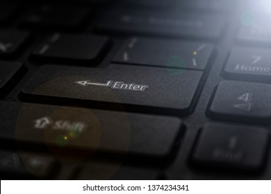 black keyboard and enter button in focus