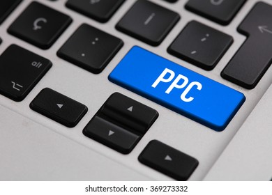 Black keyboard with PAY PER CLICK button