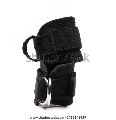 black kickback ankle strap for kickback machine isolated on white background, gym booty - gluteus workout, fitness lifting weights