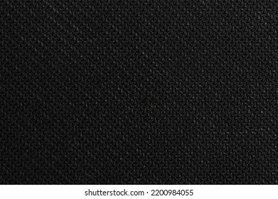 Black knit cloth structure macro close up view. Texture of clean cotton background - Shutterstock ID 2200984055