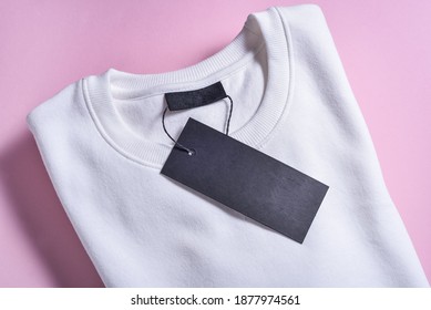 Black Label Of Sweatshirt On Pink Background