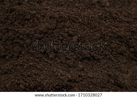 Black land for plant background. Top view. 