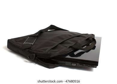 Black Laptop In The Bag Isolated On White Background