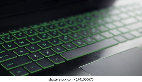Black laptop keypad and light that's shining down