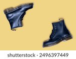 Black leather boots with a yellow background