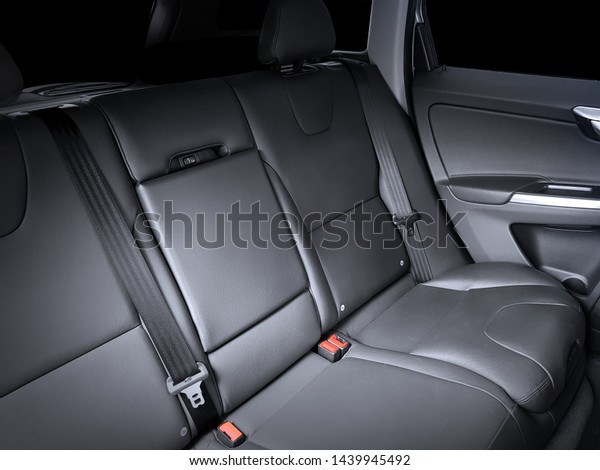 Black leather car interior. Rear seats interior of
the car.