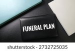 Black Leather Case with Funeral Plan Text Representing End of Life Planning, Insurance, Will and Testament Concept. 