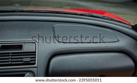 Black leather dashboard in a car