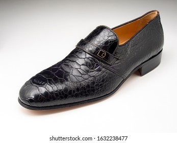 Black Leather Dress Shoe Made From Sea Turtle Skin. Isolated. All Sea Turtle Species Are Seven Turtle Species Are Endangered Or Threatened With Extinction