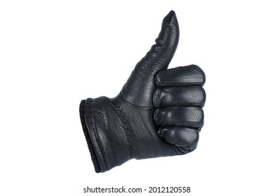 Black leather glove shows gesture thumb up. Isolated on a white background. - Shutterstock ID 2012120558