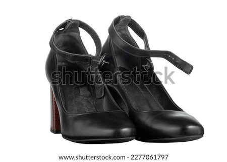 Black leather high brown heels female shoes isolated on white background. Women's Closed-toe shoes. Front view.