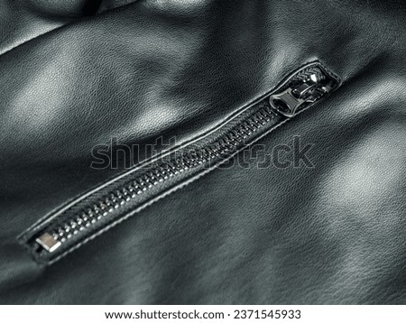Black leather jacket close-up selective