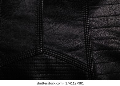 Black Leather Jacket Texture With Seams. Background Or Backdrop, Clothing Surface.