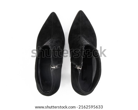 black leather jodhpur boots isolated on white background. Top view. Fashion shoes. Photoshoot for shoe shop concept
