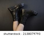 Black leather lace-up boots. Fashionable, stylish collection of women