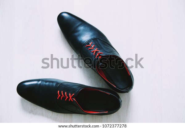 black shoes red laces