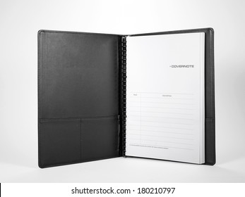 Black Leather Notebook Open On White Background