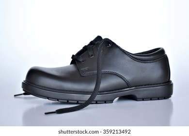 A Black Leather Patent Boys School Shoe.
