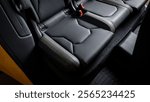 Black leather rear seat in a car