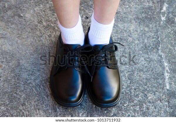 white leather school shoes