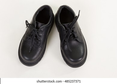 black leather school shoes