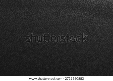 Black leather texture background.Use for jacket sofa book cover tag shoes.Rich Black leather jacket close up, macro Black leather jacket texture, soft rugged grain pattern surface fashion design bg