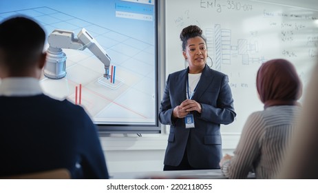 Black Lecturer Points at 3D Robotic Arm Moves and Discusses it With Students in Contemporary Auditorium. Formation of Highly Intellectual Youth in Modern Educational Environment Concept. - Shutterstock ID 2202118055