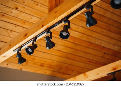 Black LED Lights Hang On Wood Beam On Ceiling In Home, Room Lighting