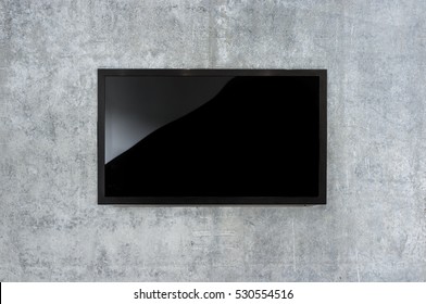 Black LED Tv Television Mockup, Blank On Gray Concrete Background