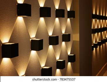 black light in the form of a cube on the wall, perspective, yellow light, a graphic pattern of light.
 - Powered by Shutterstock