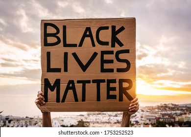 Black lives matter banner - Activist movement protesting against racism and fighting for equality - Social protests and human rights concept 