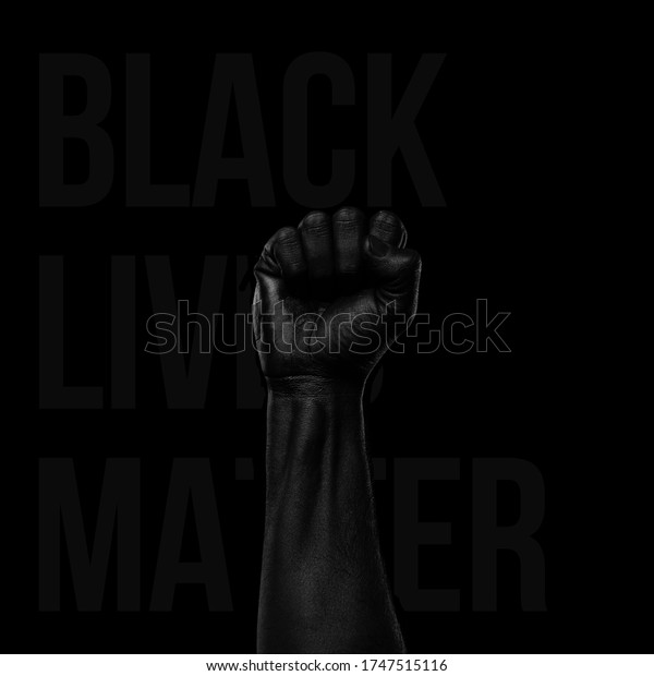 black lives matter, blackout tuesday, blackout\
week, racial injustice, black fist in air on black background,\
Fight racism.