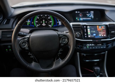 Black Luxury Modern Car Interior. Steering Wheel, Shift Lever, Speedometer, Display, Gearbox Handle, And Multimedia Dashboard. Detail Of Car Interior Inside. Automatic Gear Stick.