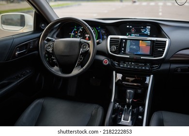 Black Luxury Modern Car Interior. Steering Wheel, Shift Lever, Speedometer, Display, Gearbox Handle, And Multimedia Dashboard. Detail Of Car Interior Inside. Automatic Gear Stick.