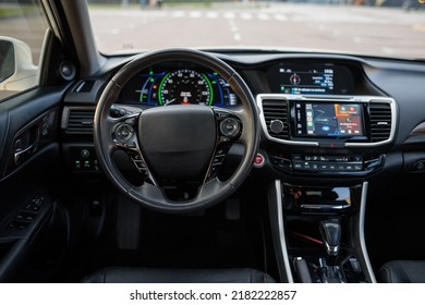 Black Luxury Modern Car Interior. Steering Wheel, Shift Lever, Speedometer, Display, Gearbox Handle, And Multimedia Dashboard. Detail Of Car Interior Inside. Automatic Gear Stick.